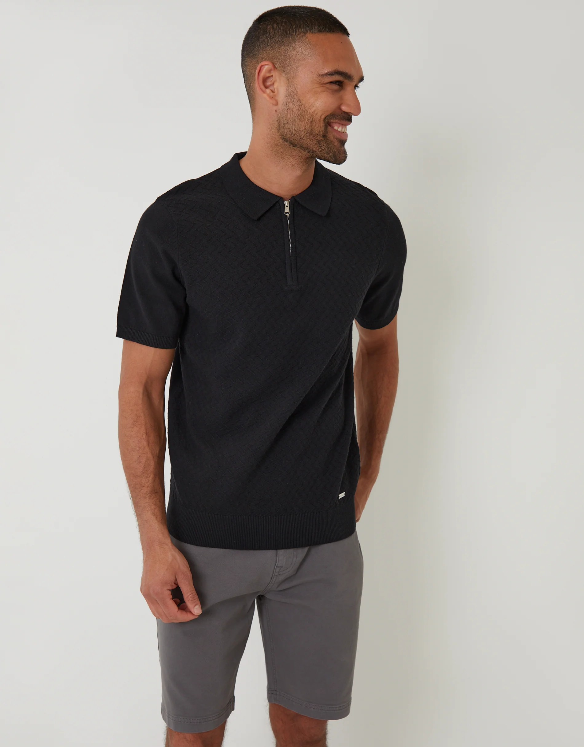 Textured Front Quarter Zip Knitted Polo in Black