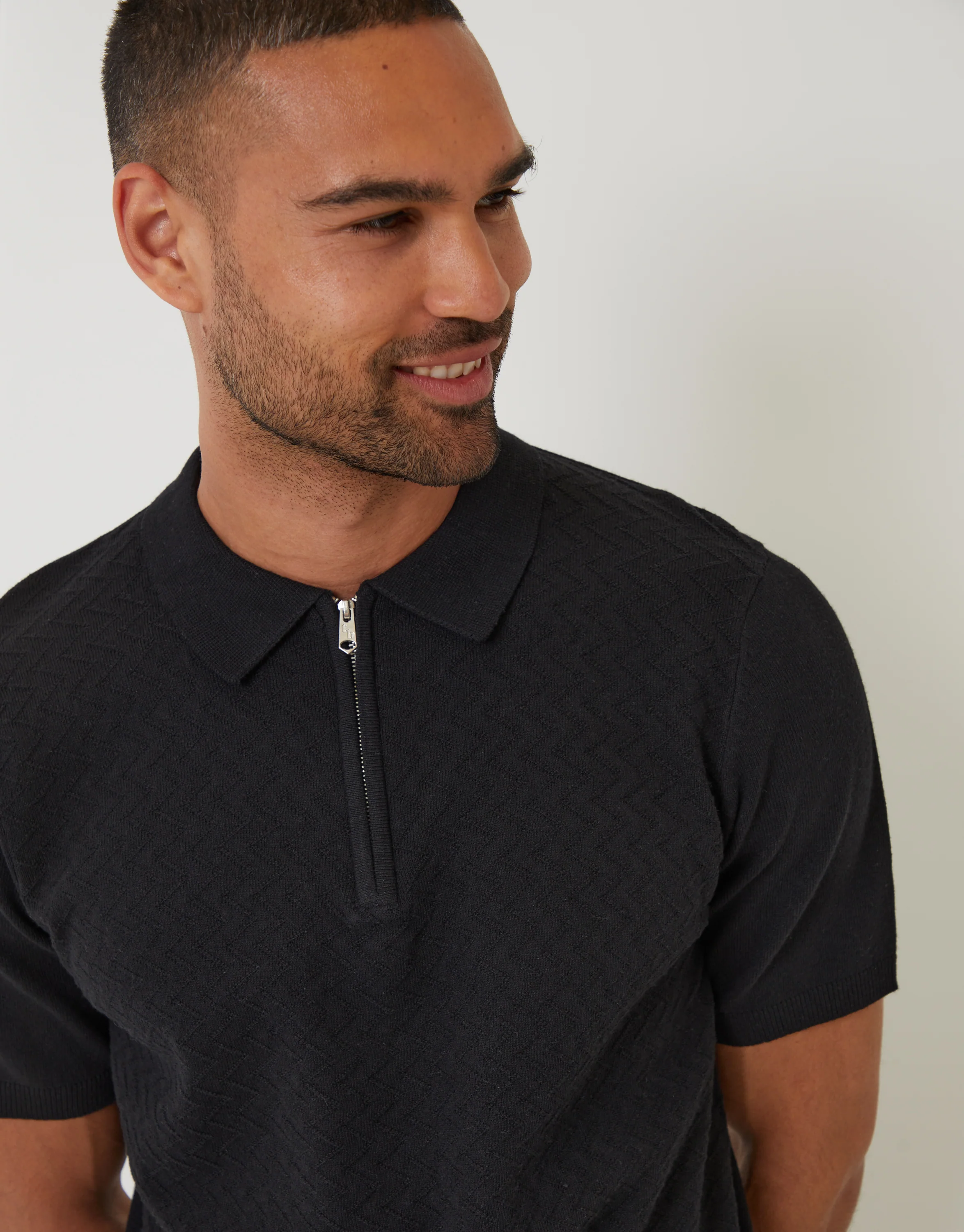 Textured Front Quarter Zip Knitted Polo in Black - Image 4