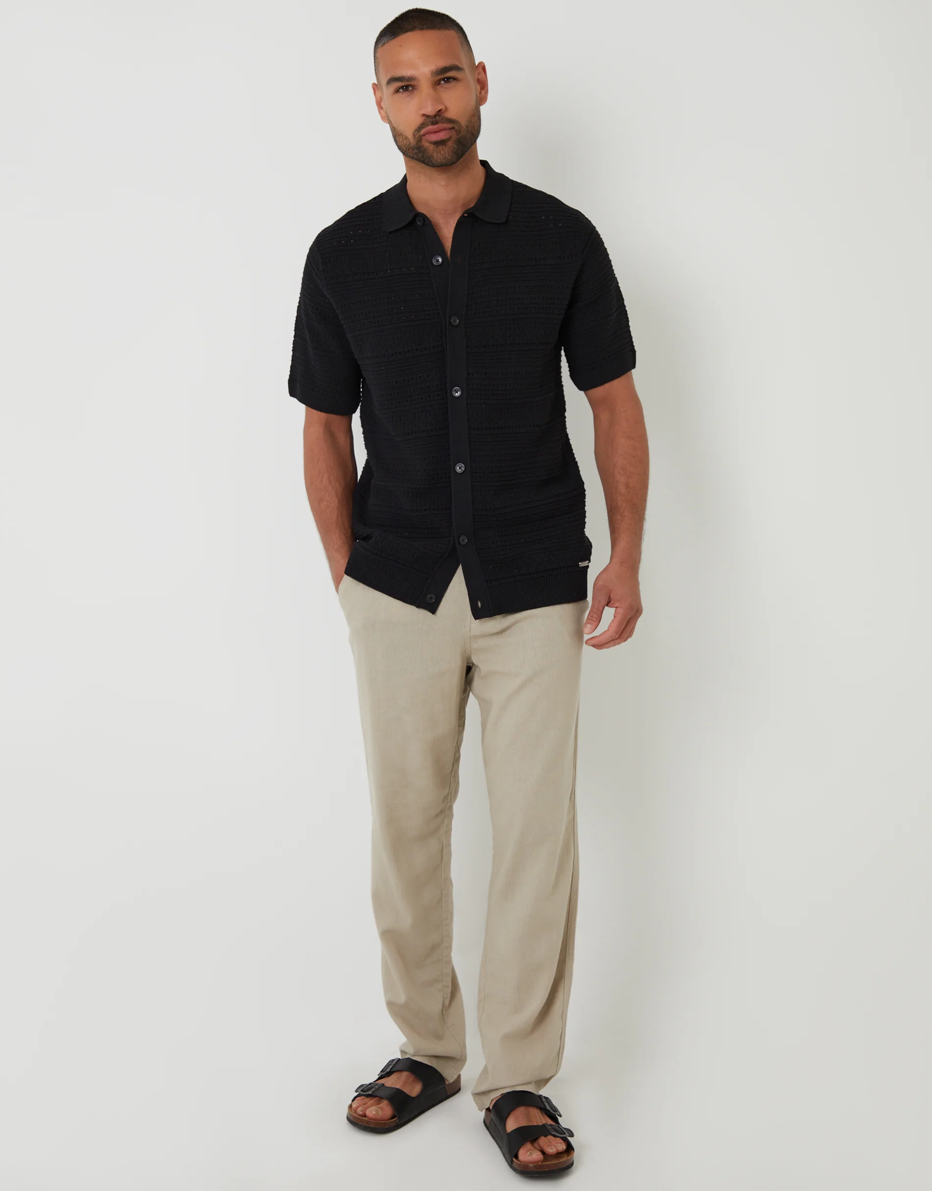 Textured Knitted Button Through Polo Shirt in Black - Image 3