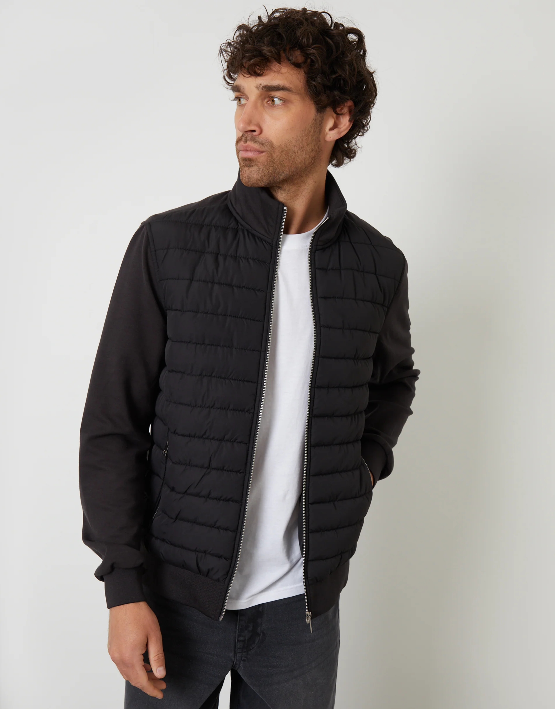 Quilted Hybrid Funnel Neck Jacket in Black