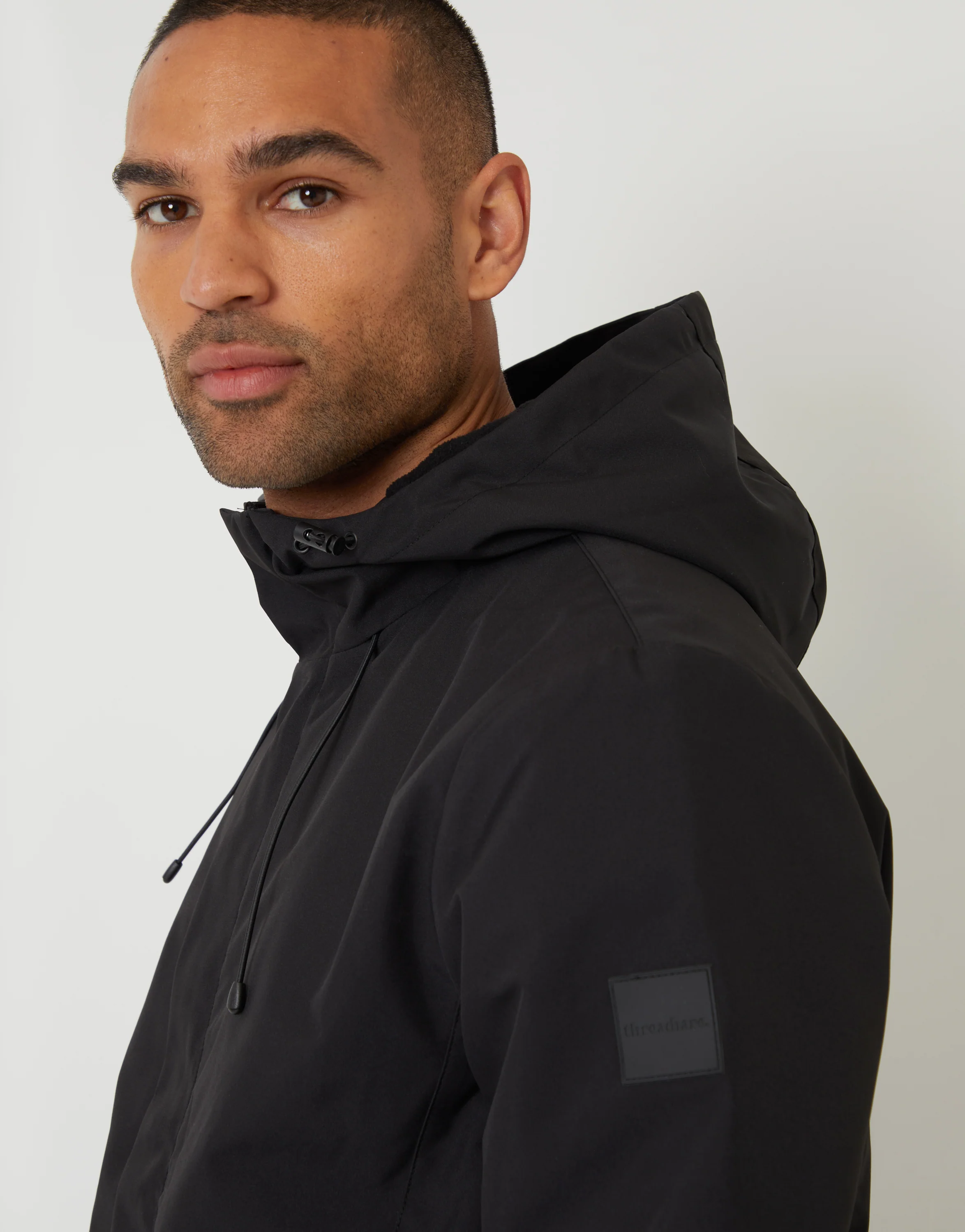 Showerproof Hooded Microfleece Lined Jacket in Black - Image 4