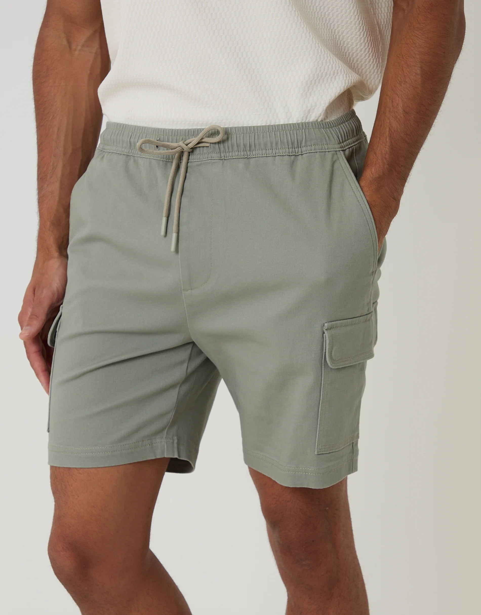 Shorter Length Elasticated Waist Stretch Cargo Shorts in Sage Green - Image 2
