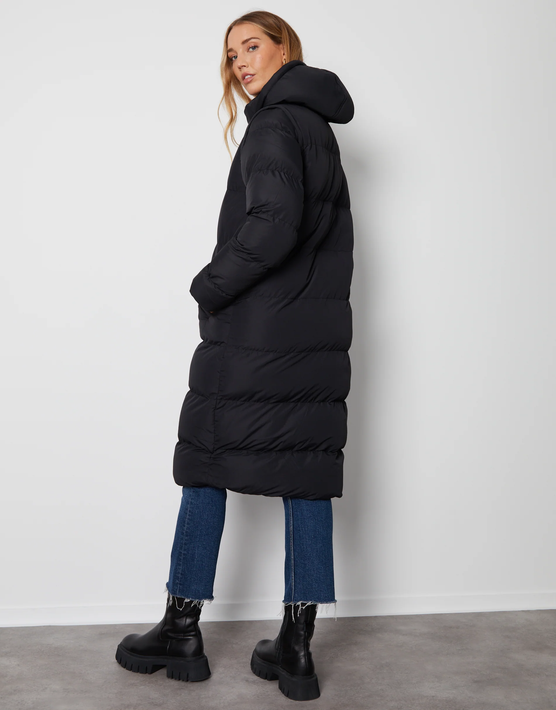 Padded Longline 2-in-1 Puffer Jacket with Detachable Sleeves in Black - Image 2